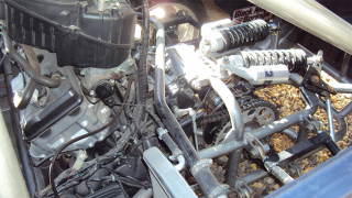 Illustration for article titled Mid-engine 1955 Fiat 600 has a Honda motorcycle powerplant